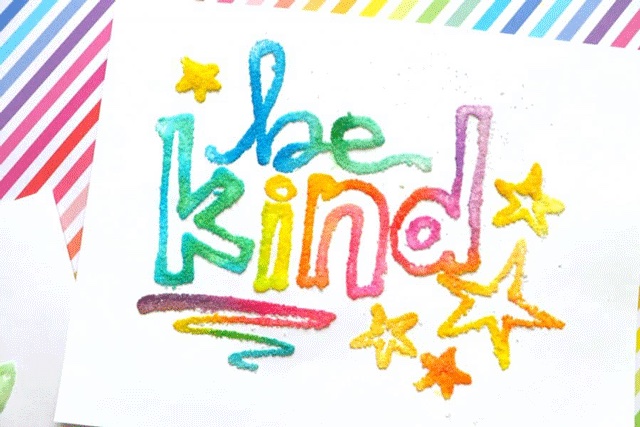 one of the easiest toddler arts and crafts is salt painting like this example that says be kind in colorful salt