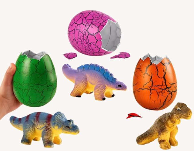 three dinosaur egg toys with three dinosaur figures