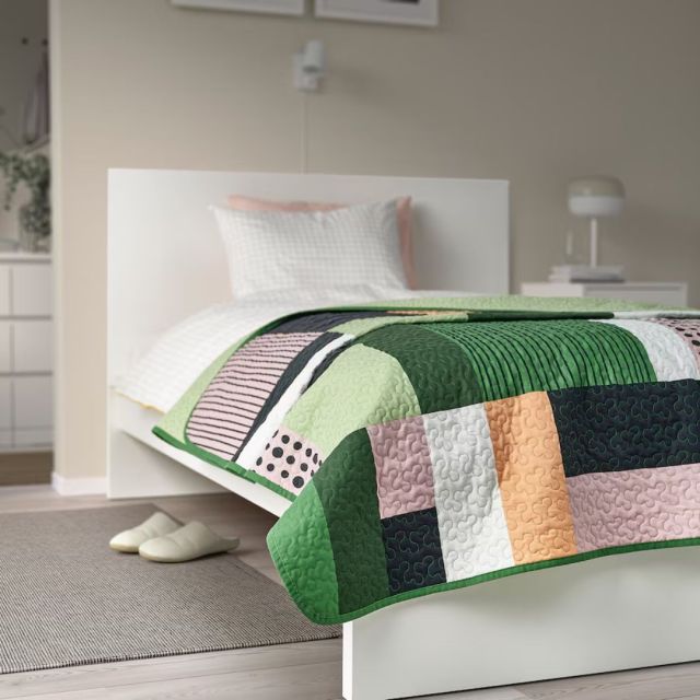 green patchwork quilt bedspread