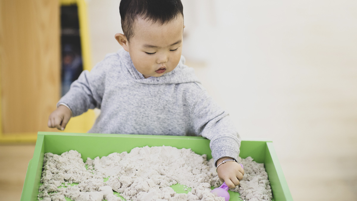 baby boy doing sensory activities for toddlers