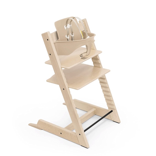 this convertible high chair in natural wood is a must have baby gear product