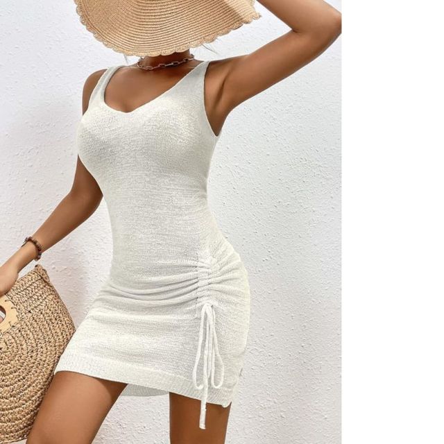 woman in off-white fitted beach coverup