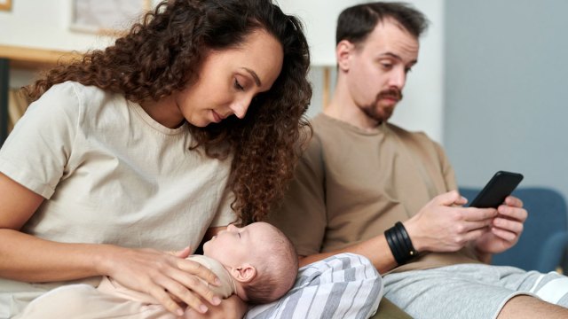 woman with baby and clueless husband