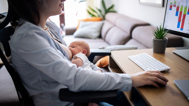 picture of a working mom breastfeeding