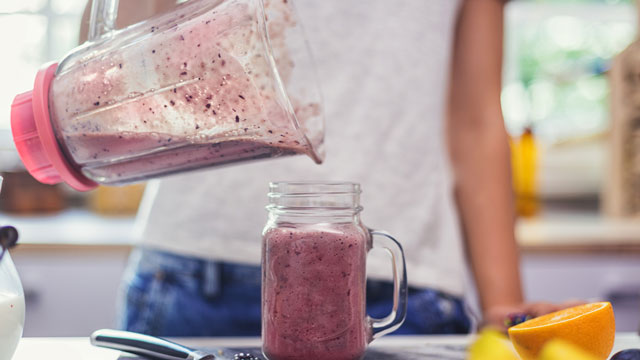 picture of a girl making a smoothie, one of the easiest meals kids can make