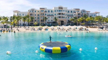 child on a water trampoline at all-inclusive resort