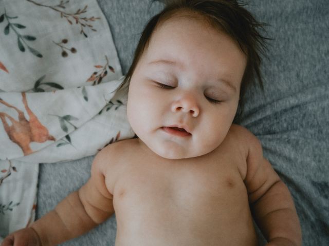 a baby asleep because of a baby sleep training method