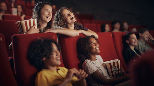 a picture of kids at the movies, a fun kids birthday party idea