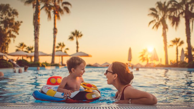 mom and child in a pool in Arizona