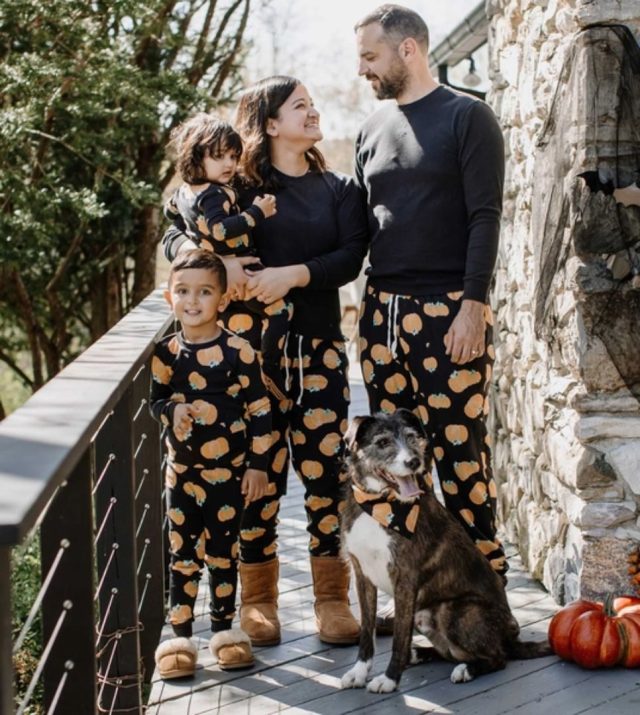 family wearing matching halloween pajamas