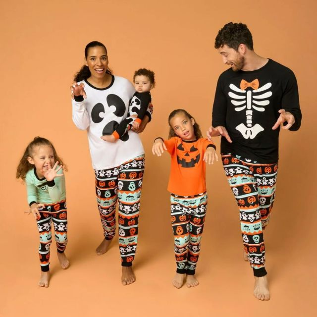 family wearing fair isle halloween pajamas