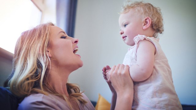 mom talking to toddler trying to build language