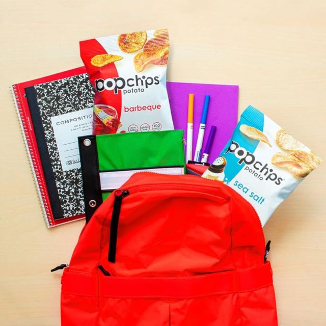 backpack with school supplies and pop chips snacks