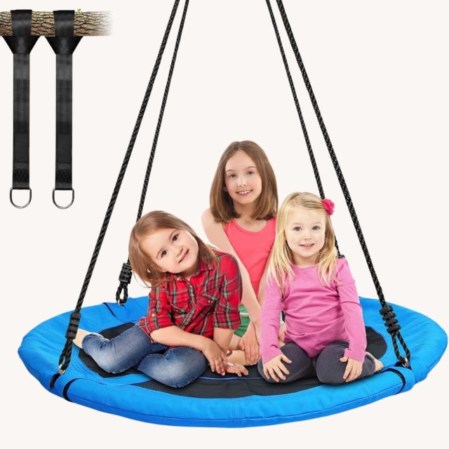 three children on saucer swing