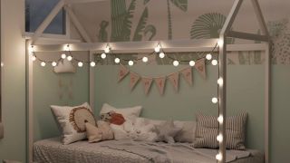 a canopy toddler bed with twinkle lights