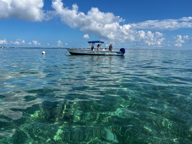 Small boat on waters of Hol Chan Marine Preserve, Belize