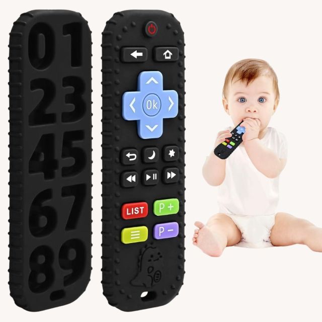 baby chewing on remote control teether toy