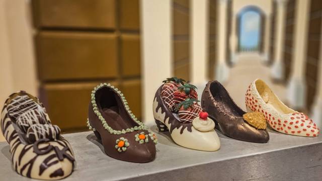 five chocolate shoes in a row at Chocolate Kingdom in Orlando, Florida