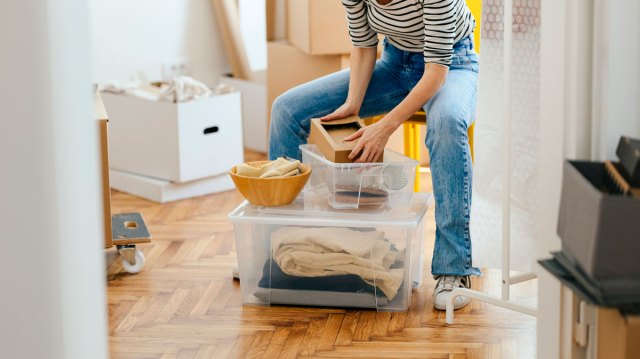 woman organizing drawers in her home