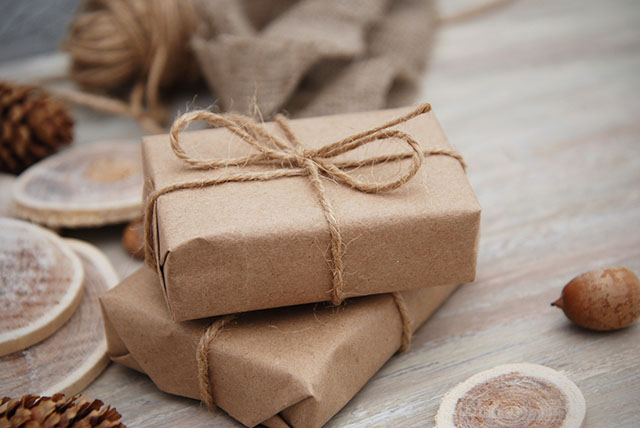 using brown paper grocery bags as wrapping paper is one of the best gift wrapping hacks