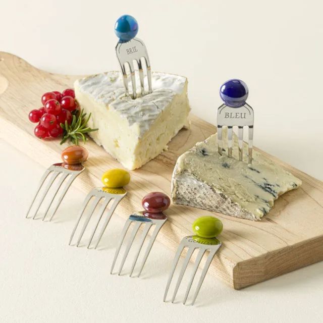 five cheese marker forks on cheese tray