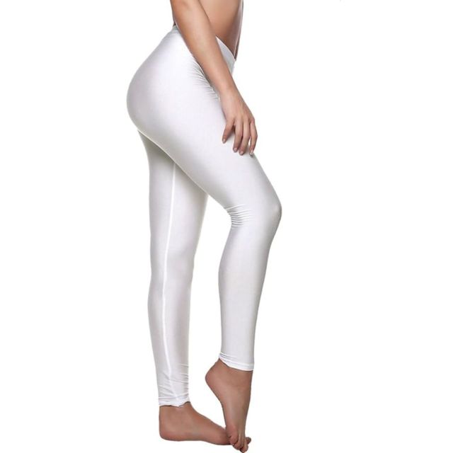 bottom half of woman wearing white leggings