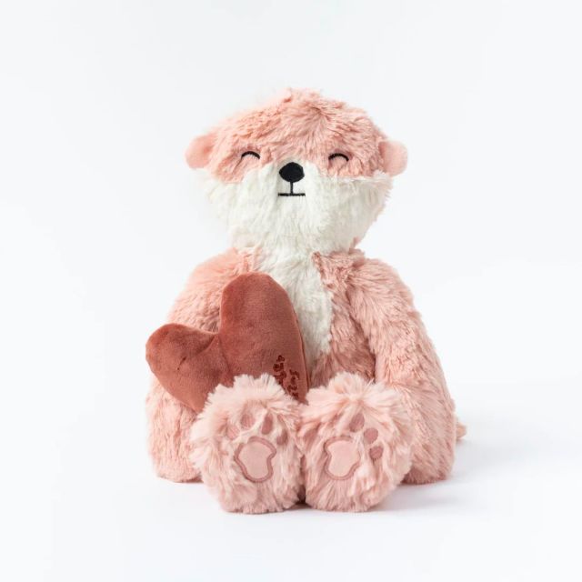 blush pink plush otter holding a plush dark pink heart