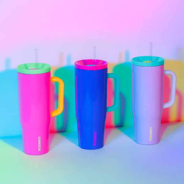 3 multi-colored tumblers with handles