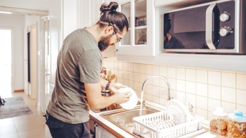 husband doing the dishes and sharing chores