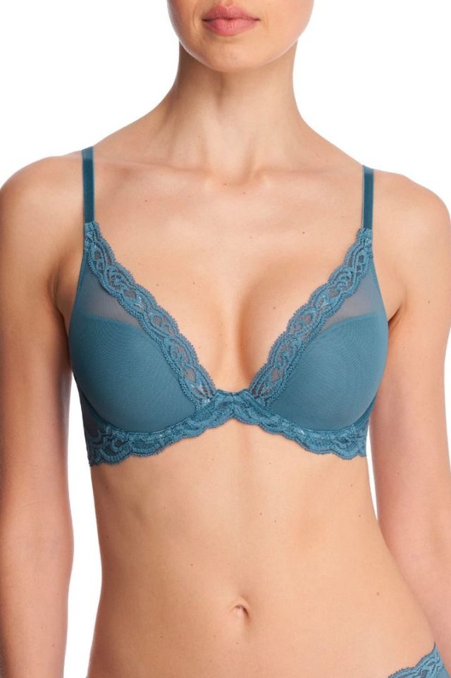 woman in teal green lace plunge bra