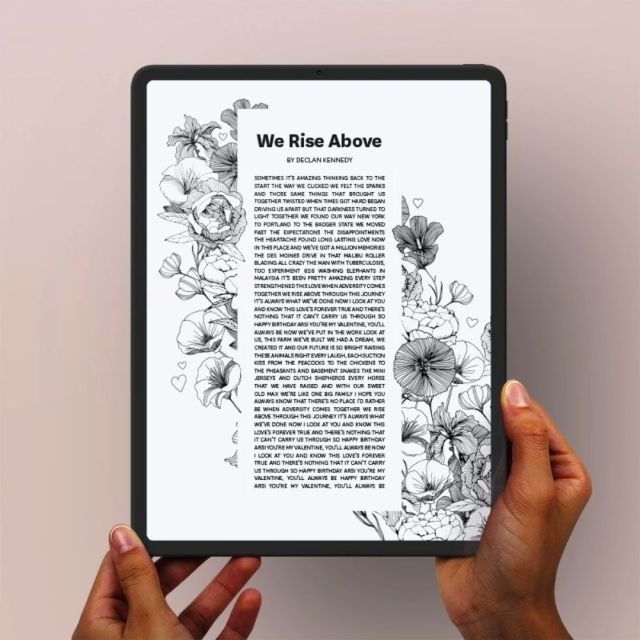 hands holding a digital song print with floral art