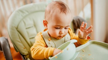 baby throwing food off high chair