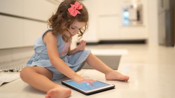 toddler about to have a meltdown over iPad