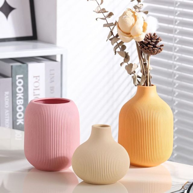 set of 3 pastel vases on tabletop