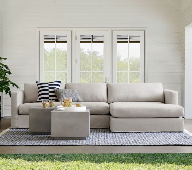 grey outdoor slip covered sectional sofa outside