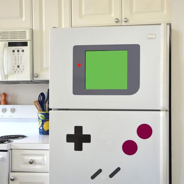 white fridge with nintendo DES magnets