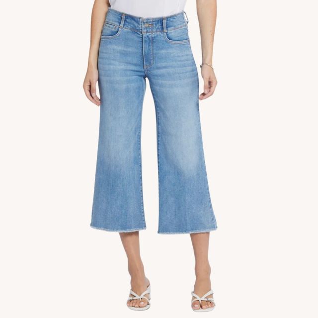 woman wearing cropped denim kick flare jeans