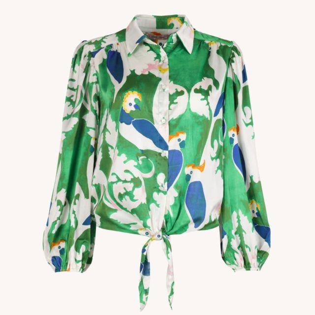 white blouse with green and blue bird print