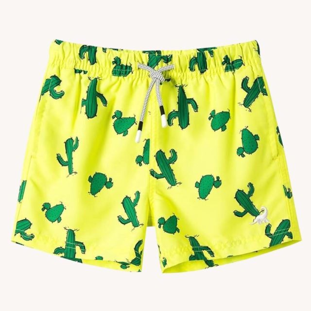 bright yellow swim trunks with green cactus print