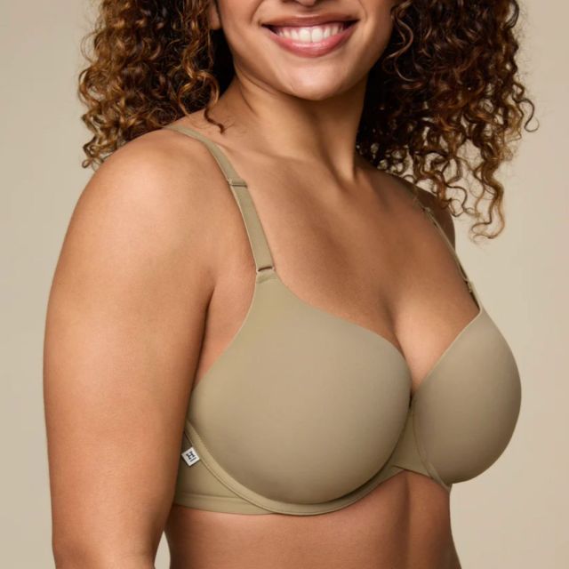woman wearing tan t-shirt bra