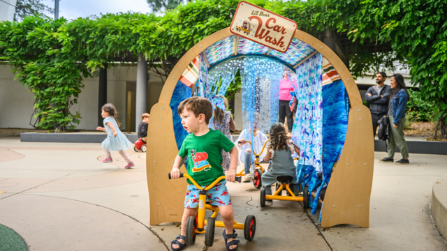 The tricycle carwash at Kidspace Children's Museum