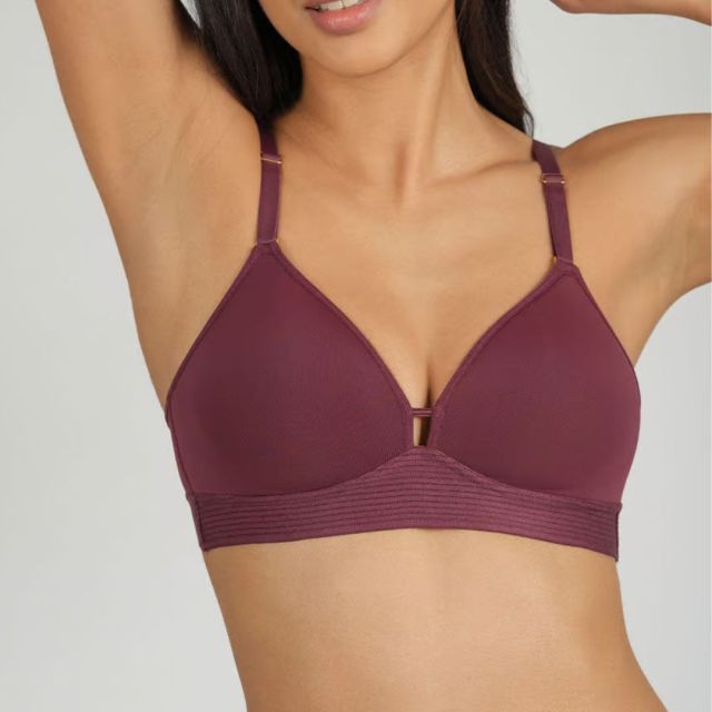 woman wearing wine-colored bra