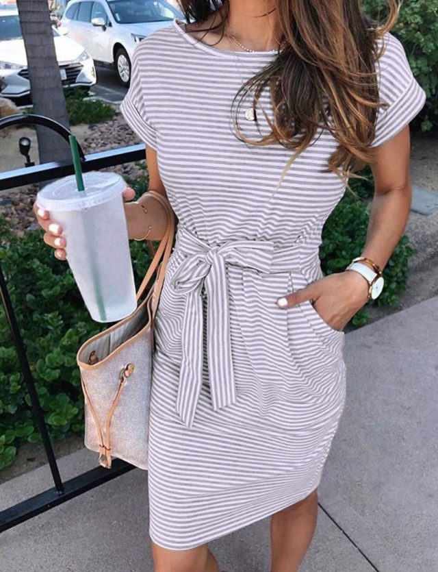 woman wearing grey striped t-shirt dress