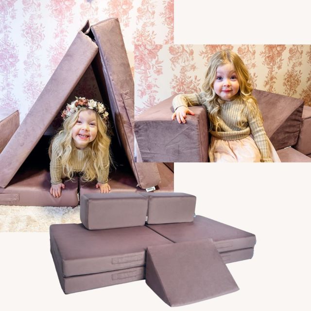 little girl playing on a mauve kids' play couch