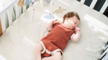 A sleeping infant whose parents aren't making the common mistakes many make with kid and baby naps