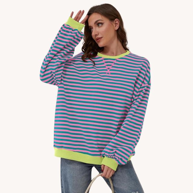 woman wearing striped sweatshirt