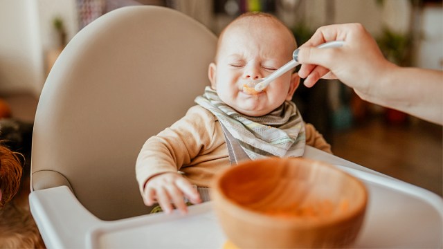 baby eating puree that they can taste as part of their sensory development