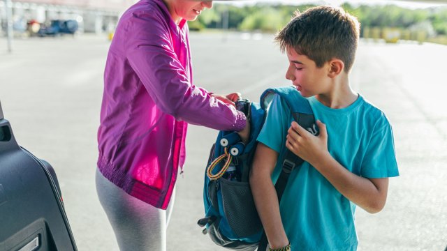 boy about to have an uncomfortable conversation with his mom