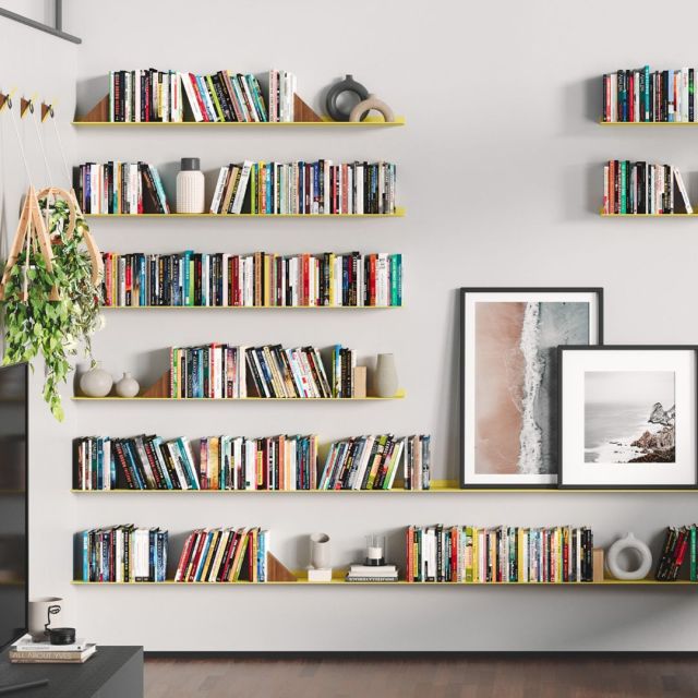 wall of floating bookshelves