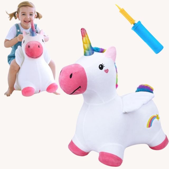 little girl on bouncy unicorn toy